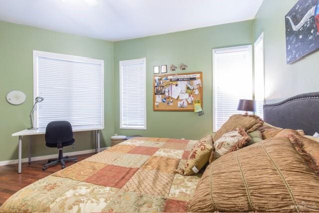 bedroom featuring dark hardwood / wood-style floors