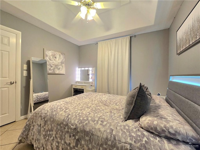 1511 Oak Dr, Mission, TX 78572 - bedroom with light tile patterned flooring and ceiling fan