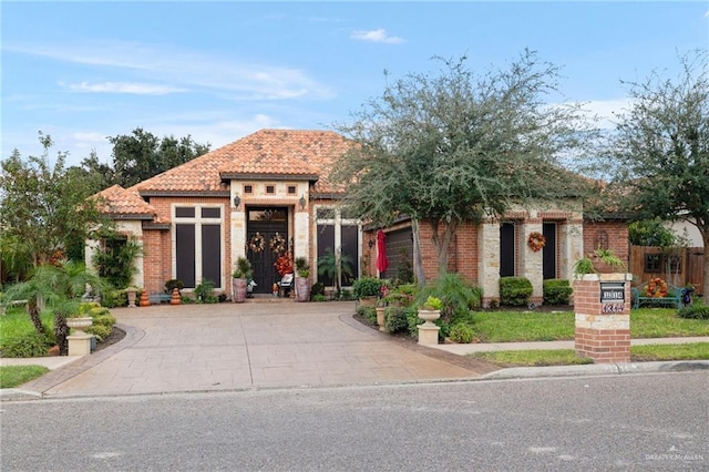 view of front of home with a garage