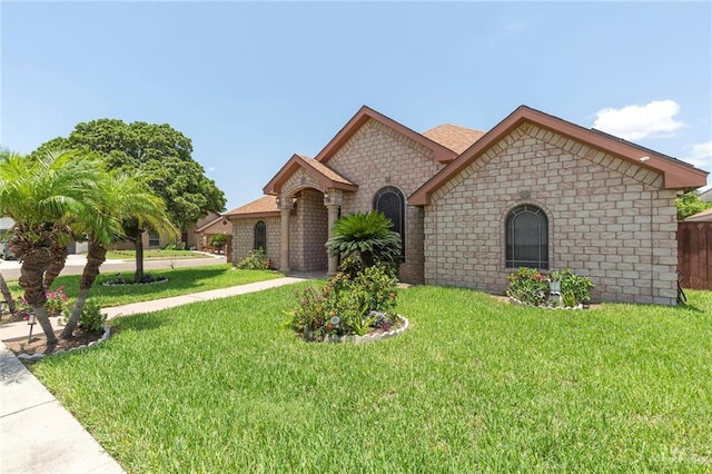 view of front of home with a front lawn