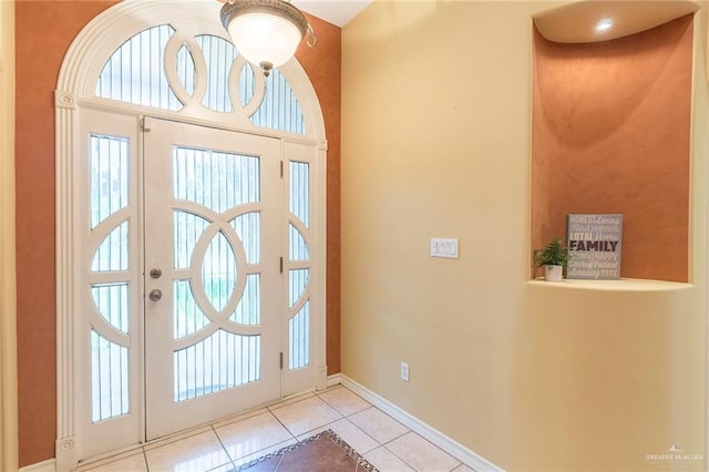 view of tiled foyer entrance