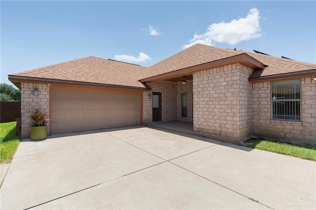 ranch-style house featuring a garage