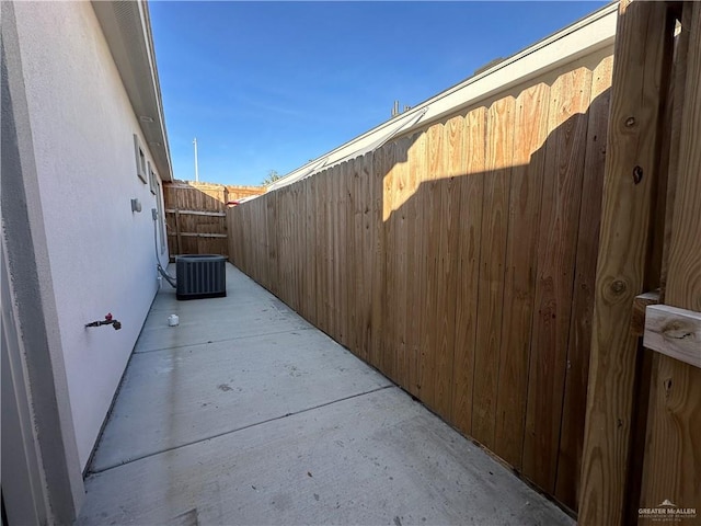 view of patio with central AC