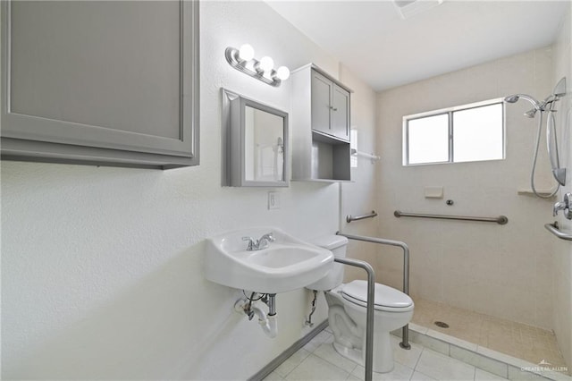609 E Sprague St, Edinburg, TX 78539 - full bath featuring tiled shower and tile patterned flooring