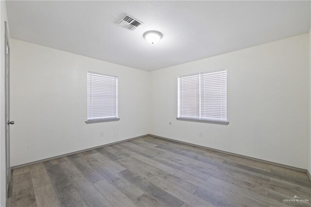609 E Sprague St, Edinburg, TX 78539 - unfurnished room with wood finished floors