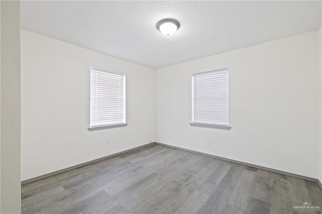 609 E Sprague St, Edinburg, TX 78539 - spare room with wood finished floors