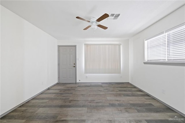 609 E Sprague St, Edinburg, TX 78539 - empty room featuring a ceiling fan and wood finished floors