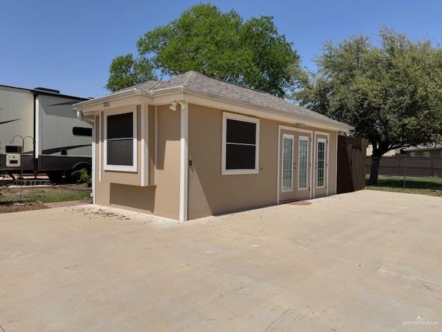3810 Pelican Way, Mission, TX 78572 - view of outbuilding with french doors and fence