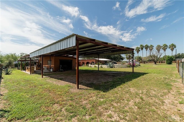 view of parking / parking lot featuring a yard