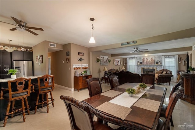 dining space with ceiling fan