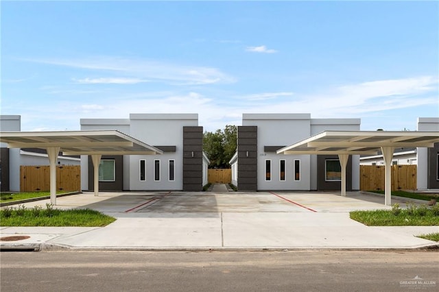 contemporary house with a carport