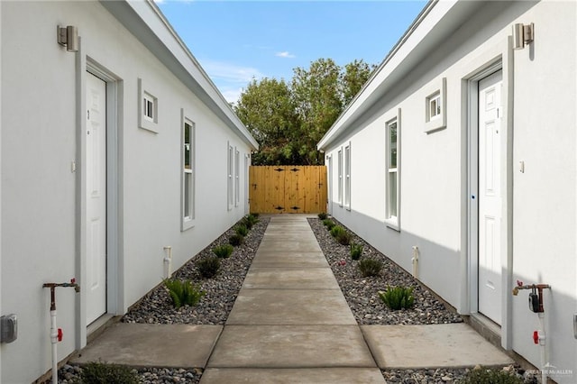 view of side of home featuring a patio area