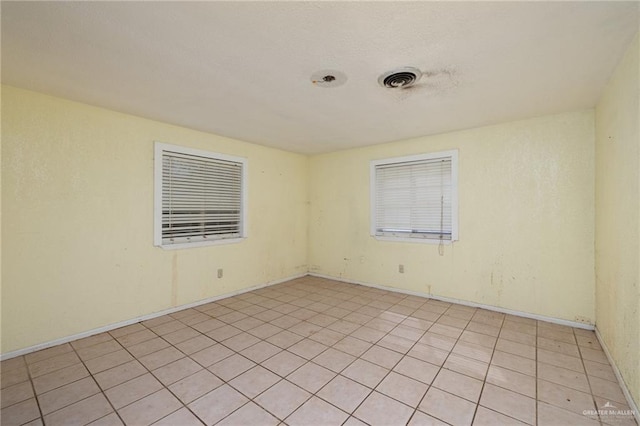 view of tiled empty room