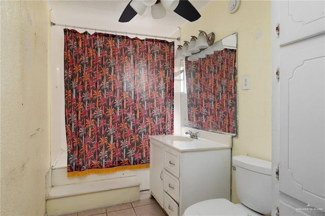 full bathroom with shower / tub combo, vanity, ceiling fan, tile patterned flooring, and toilet