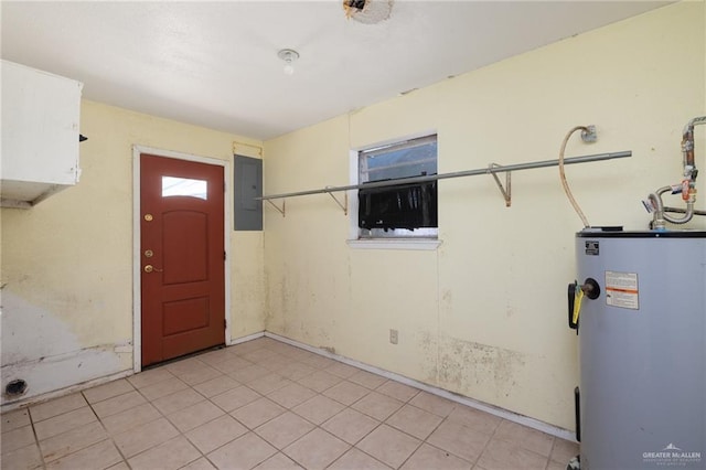 tiled entryway with electric panel and water heater