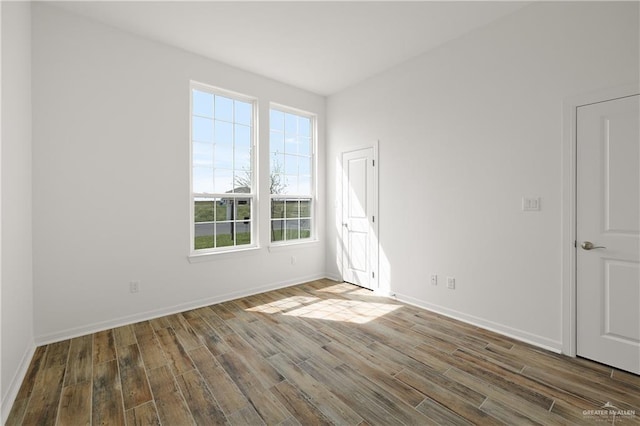 14724 Aqualina Way, Mcallen, TX 78504 - spare room with wood finished floors and baseboards