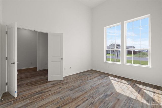 14724 Aqualina Way, Mcallen, TX 78504 - spare room featuring healthy amount of natural light, wood finished floors, and baseboards