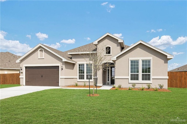 14724 Aqualina Way, Mcallen, TX 78504 - view of front of property with stucco siding, driveway, and an attached garage