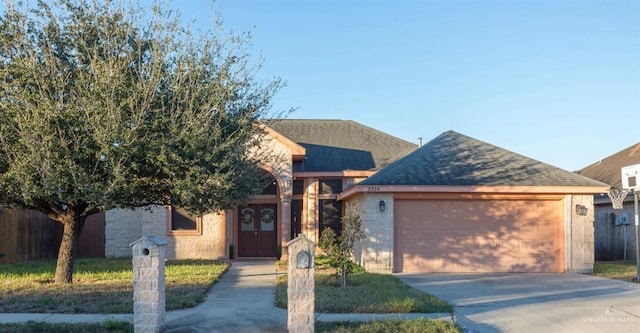 view of front of property with a garage