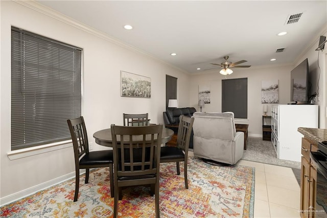 2203 Kingfisher Ln, Mission, TX 78572 - dining space featuring recessed lighting, crown molding, ceiling fan, baseboards, and light tile patterned floors