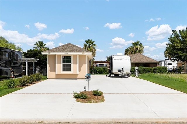 2203 Kingfisher Ln, Mission, TX 78572 - view of home's community featuring concrete driveway
