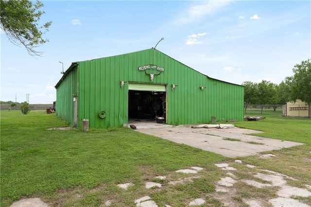 15668 Primera Rd, Harlingen, TX 78552 - view of pole building with a lawn and concrete driveway