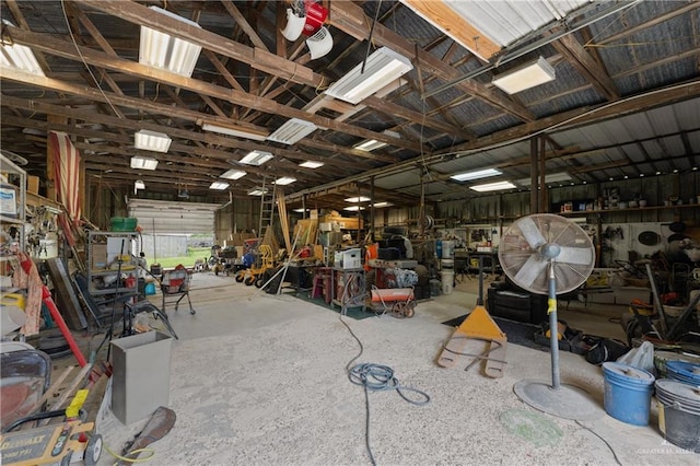 15668 Primera Rd, Harlingen, TX 78552 - misc room with a workshop area, concrete floors, and a garage