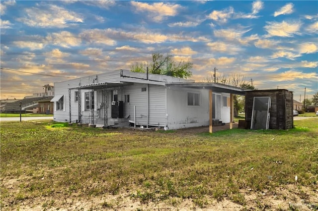 exterior space with crawl space, a yard, and a pergola