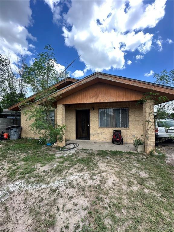 1112 E Fay St, Edinburg, TX 78539 - view of front of home with brick siding