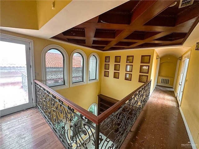 4132 Cosentino Dr, Mcallen, TX 78504 - hallway with wood-type flooring, coffered ceiling, an upstairs landing, and beamed ceiling
