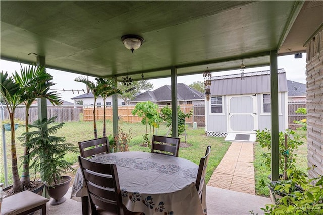 view of patio / terrace featuring a shed