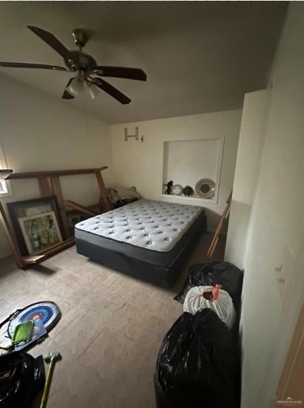 bedroom featuring ceiling fan