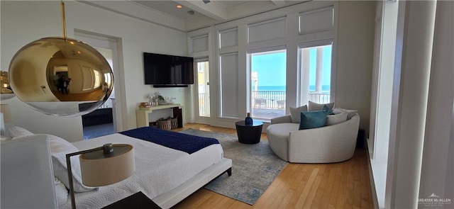 6518 Beach Dr, South Padre Island, TX 78597 - living area with beamed ceiling and wood finished floors