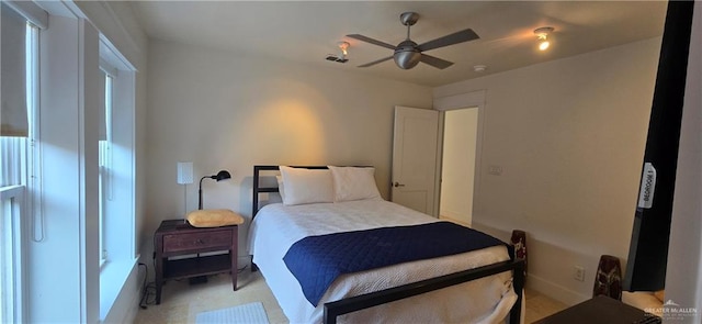 6518 Beach Dr, South Padre Island, TX 78597 - bedroom featuring ceiling fan and baseboards