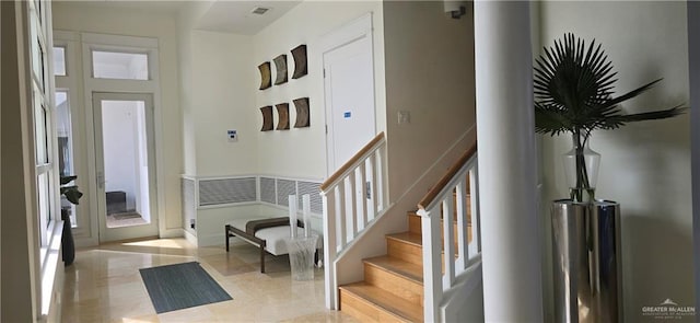 6518 Beach Dr, South Padre Island, TX 78597 - entrance foyer featuring stairs and light tile patterned floors
