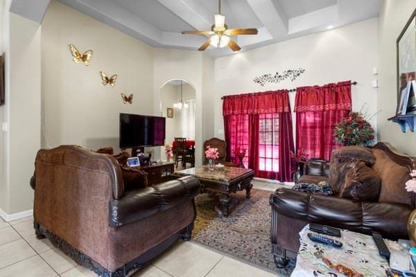 1501 Lookout St, Edinburg, TX 78541 - living room with arched walkways, tile patterned flooring, and a ceiling fan