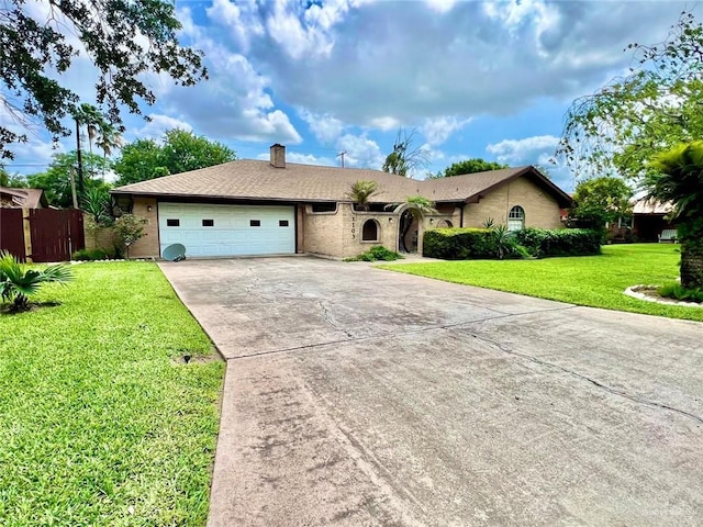 ranch-style home featuring fence, an attached garage, a front lawn, a chimney, and driveway