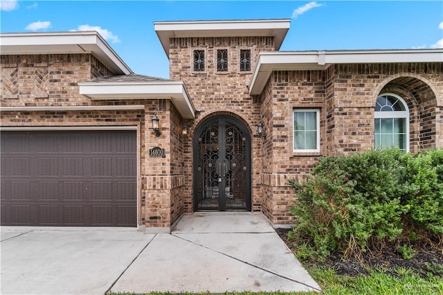 entrance to property featuring french doors