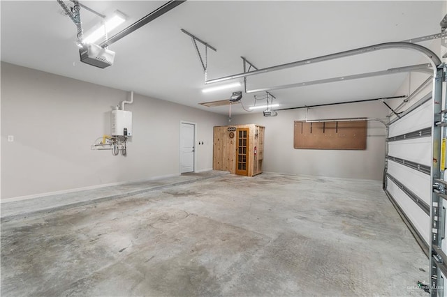 garage featuring tankless water heater and a garage door opener