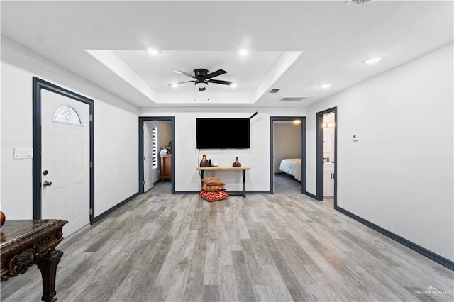16311 Citrus Dr, Mcallen, TX 78541 - living area featuring a raised ceiling, ceiling fan, light wood-style floors, and recessed lighting