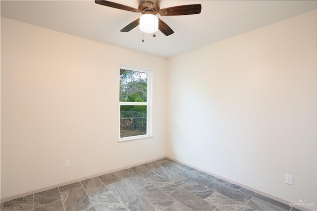 empty room featuring ceiling fan