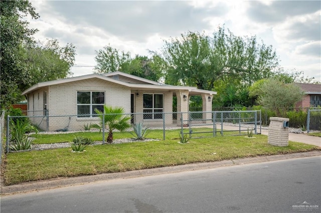 ranch-style house with a front yard