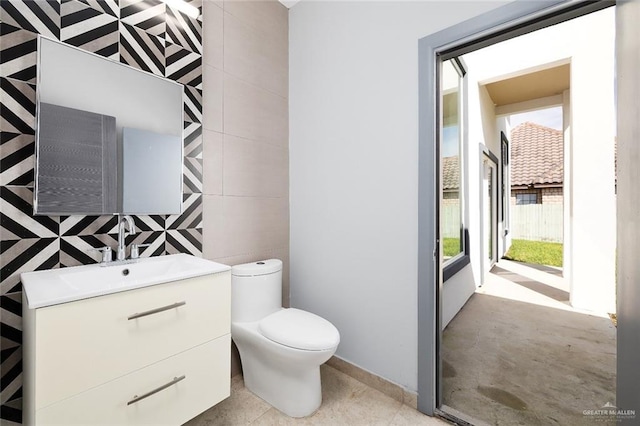 bathroom with vanity and toilet