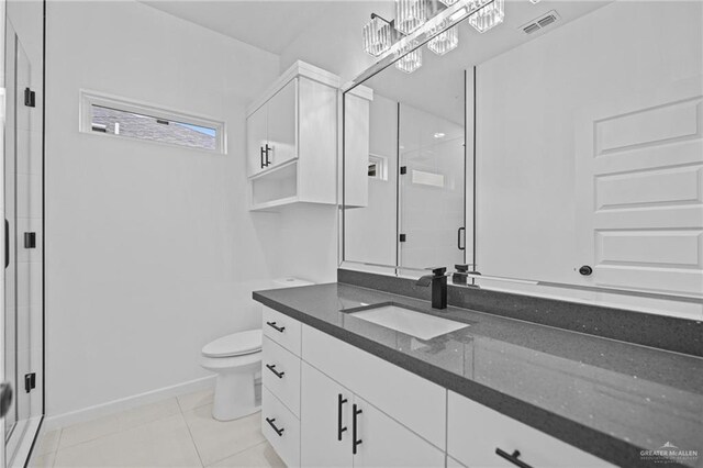 full bath with visible vents, baseboards, a stall shower, and tile patterned flooring