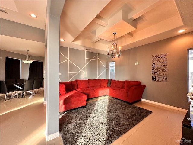 tiled living room with a chandelier and a tray ceiling