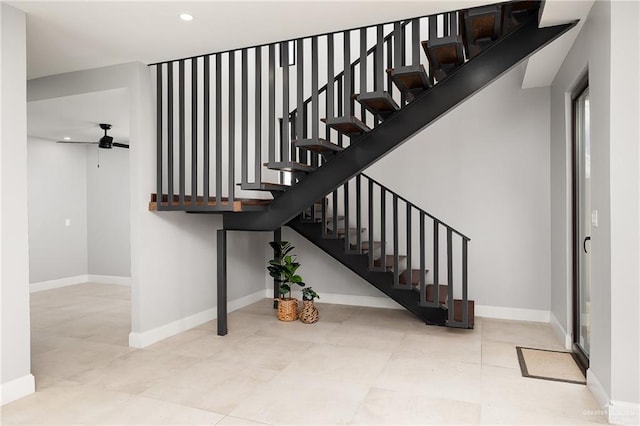 stairway featuring recessed lighting, tile patterned flooring, a ceiling fan, and baseboards