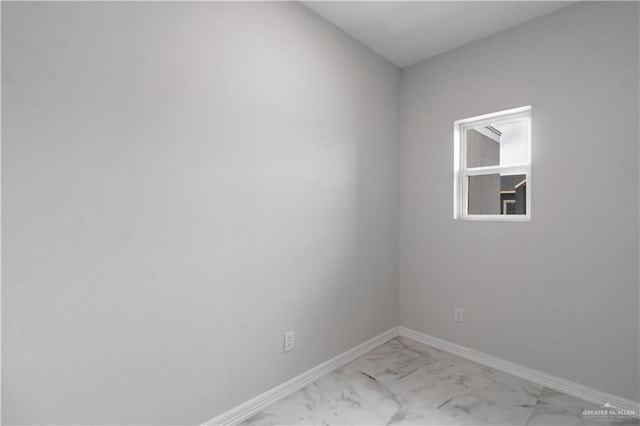 5318 N Crown Pt, Pharr, TX 78577 - spare room featuring light marble finish floors and baseboards