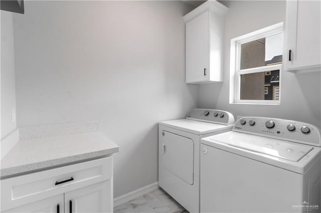 5318 N Crown Pt, Pharr, TX 78577 - washroom featuring separate washer and dryer, cabinet space, and light marble finish floors