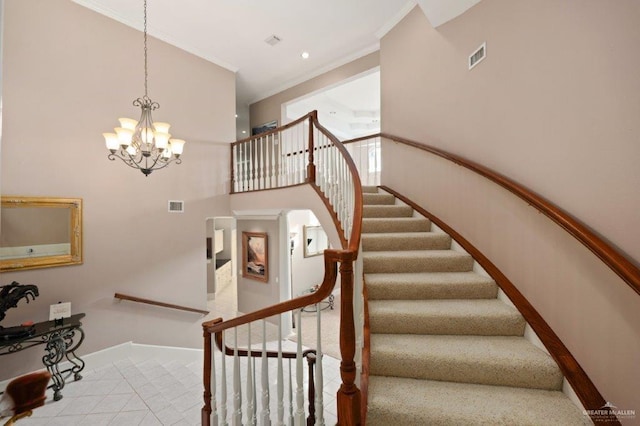 stairway featuring crown molding and a chandelier