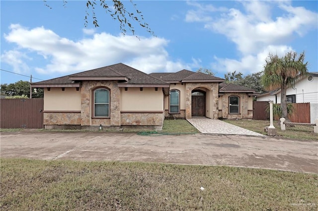 view of front of home with a front yard